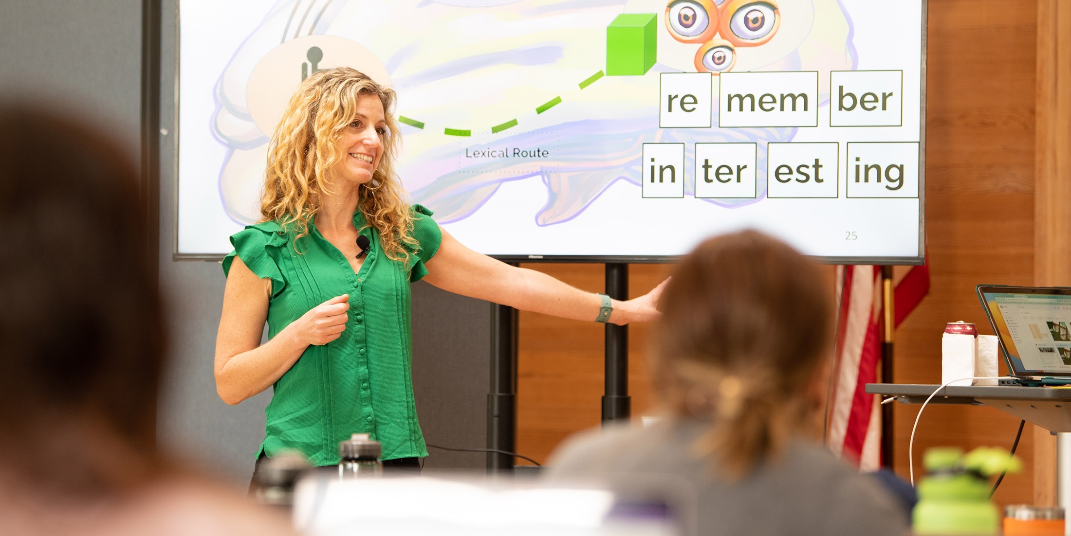 Director Jodi Amaditz presenting to an audience of CTI attendees